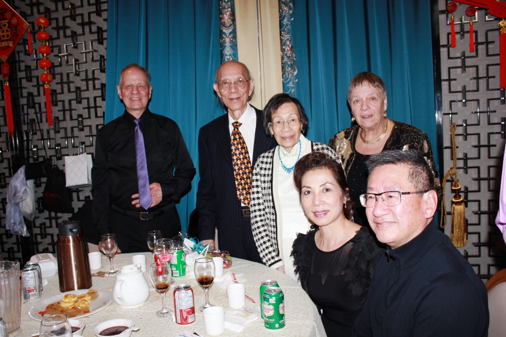 Guests smiling at the banquet reception