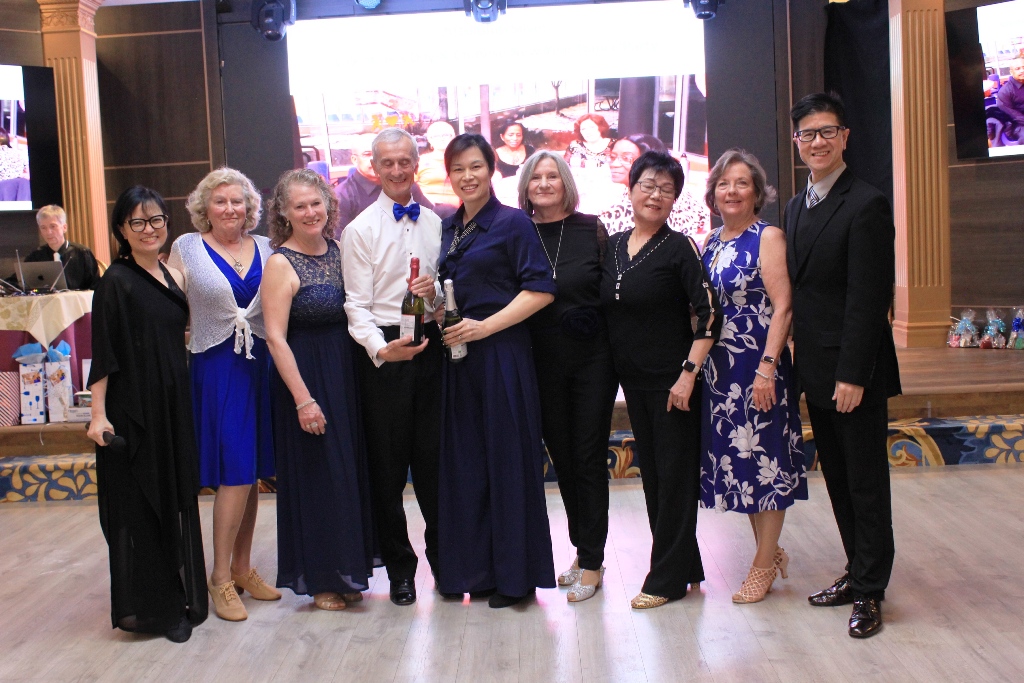 Group toast celebration on the dance floor